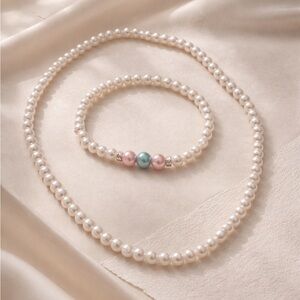 The Élan Pearl Set
Gourley Collection